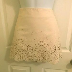Ivory skirt with cut-out details!